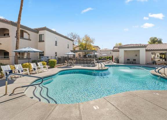 Bayside Apartments in Phoenix, Arizona Pool with Lounge Chairs