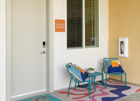 A white door with a number 1122 on it.