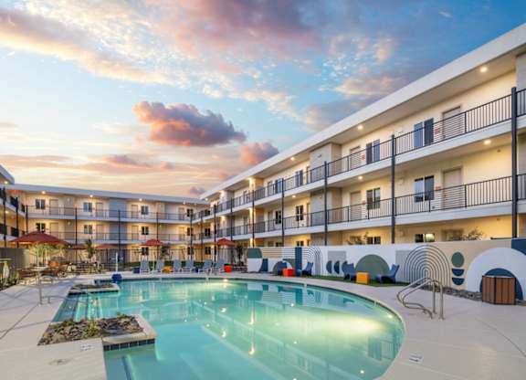 Cabana Aldea New Apartments in Glendale, Arizona Exterior and Pool at Dusk