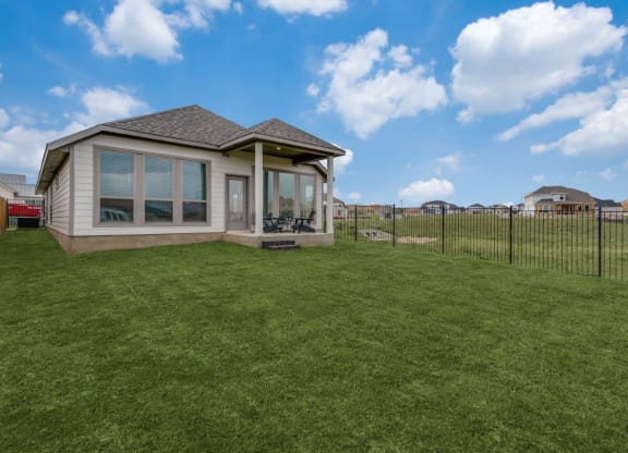 Caso Santa Rita Ranch Home Exterior and Backyard