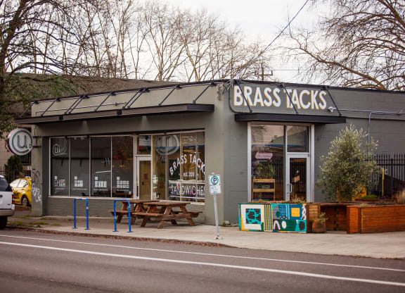 the exterior of a bass acids store on the side of a street