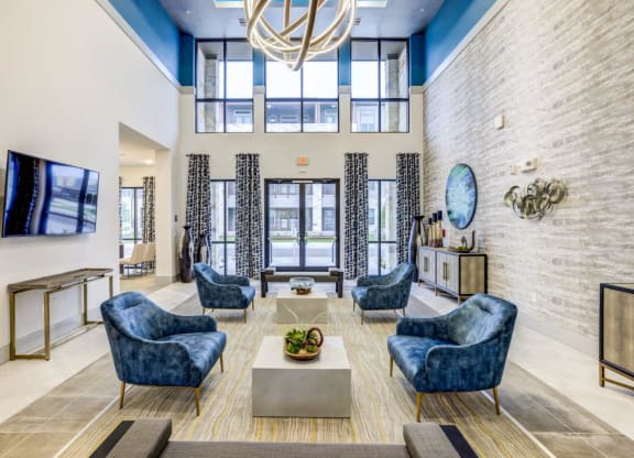 Cromwell at Plum Creek Apartments Clubhouse Seating Area with Television
