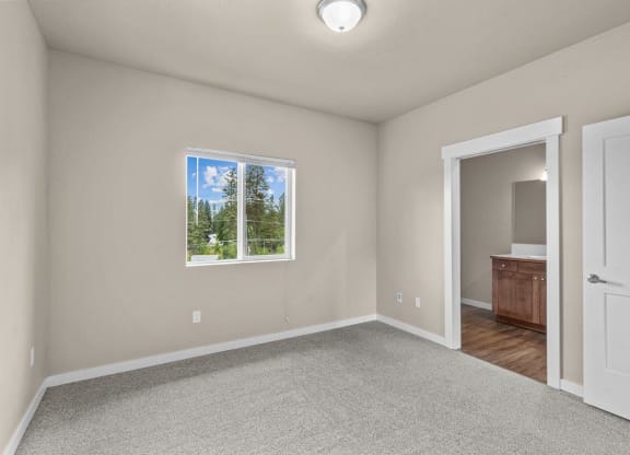 Dakota Flats Apartments in Spokane, Washington Bedroom with Attached Bathroom