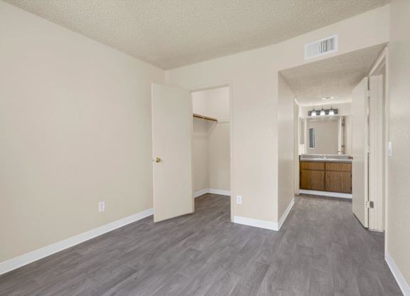 A room with a doorway leading to another room.