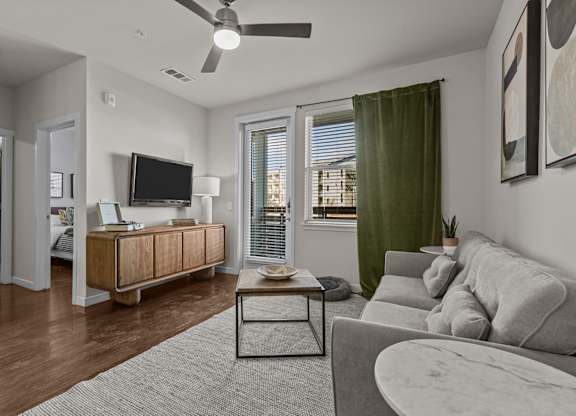 Living Room With TV at Discovery at The Realm, Lewisville