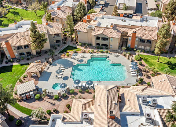 A large house with a pool in the backyard.