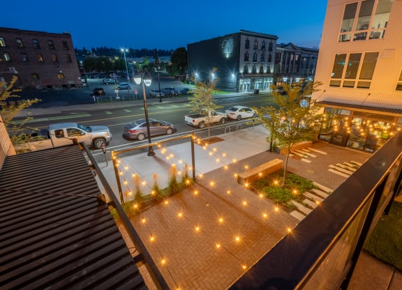 The Warren Apartments courtyard string lights at night