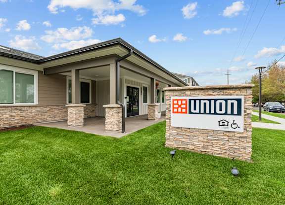 A house with a sign that says Union in front of it.
