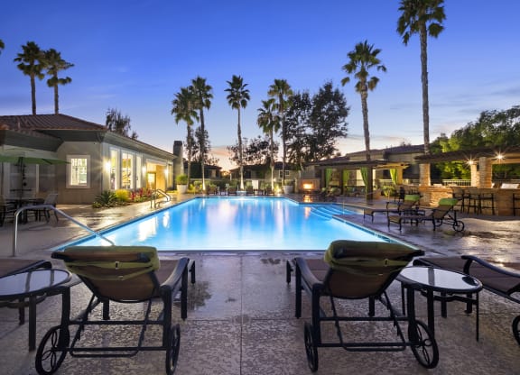 Estancia at Mission Grove Apartments Pool at night