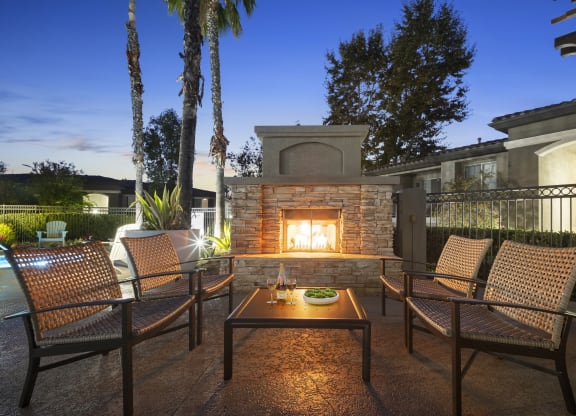 Estancia at Mission Grove Apartments Fireplace at Night