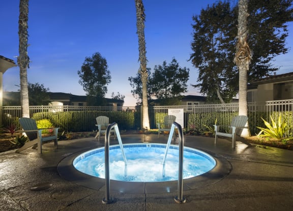 Estancia at Mission Grove Apartments Hot Tub at night