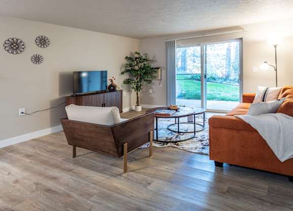 Eagle Rock Apartments in Spokane Valley, Washington Model Living Room with Private Patio