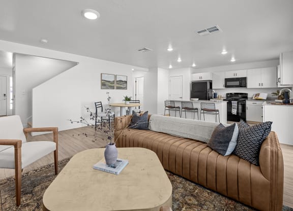a living room with a couch and a table