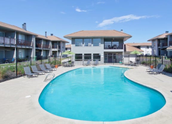 Evergreen Ridge Pool with Lounge Chairs
