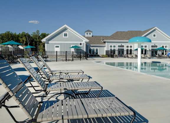 EVOLV at Stonehaven Townhomes in White Plains, Maryland Pool with Lounge Chairs