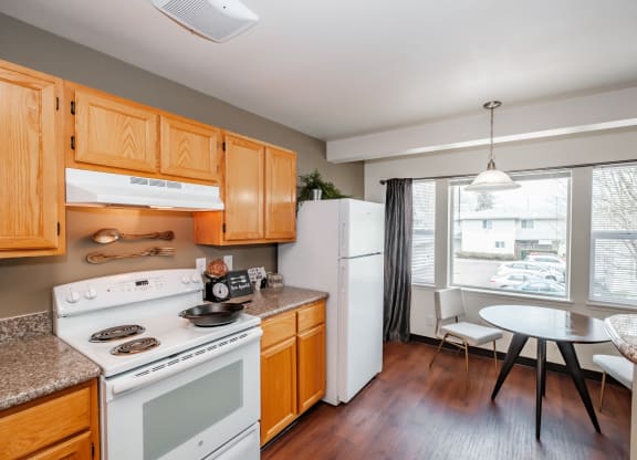 a kitchen and dining area at Brentwood Estates