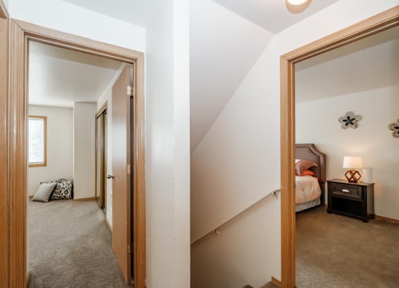a view of the bedroom from the hallway