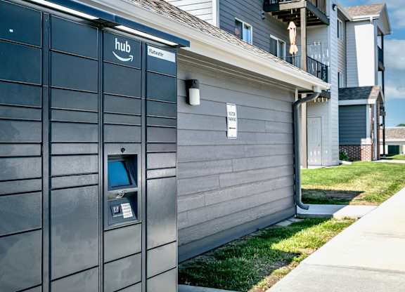 A grey building with a sign that says hub on it.