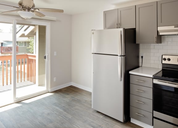 a kitchen and living room in a 555 waverly unit