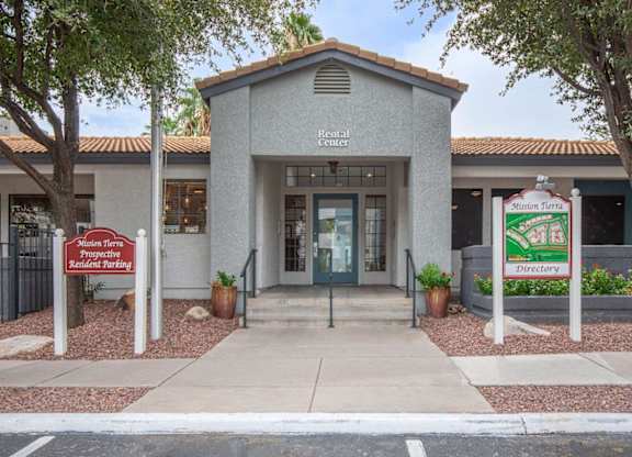 The front of a building with a sign that says "Resident Center".