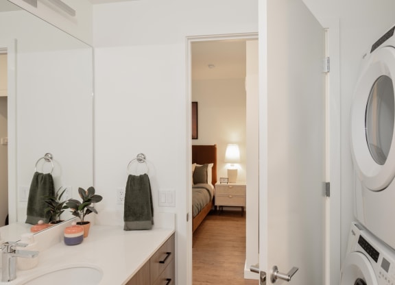 The Gabe Apartments in Portland, Oregon Model Bathroom with Washer and Dryer