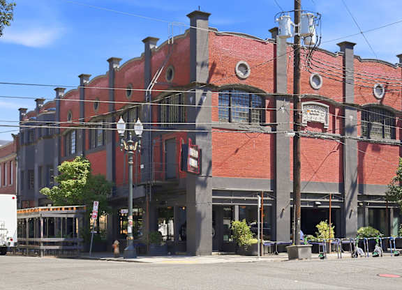A large red building with a sign on it.