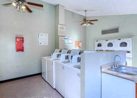 A laundry room with a washer and dryer.