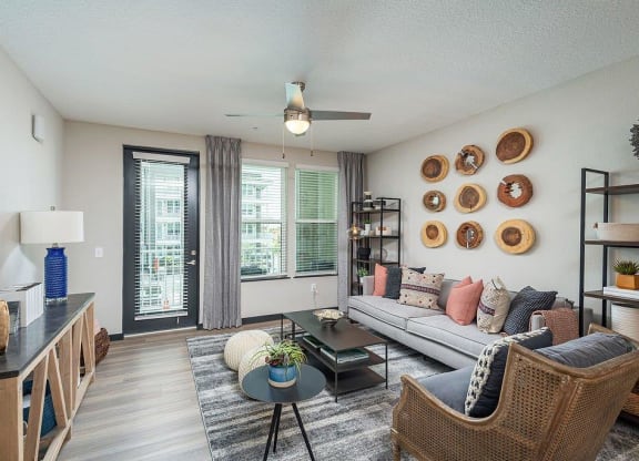 a living room with a couch and a table