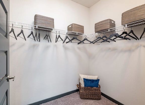 a room with a chair and a rack with chairs on it