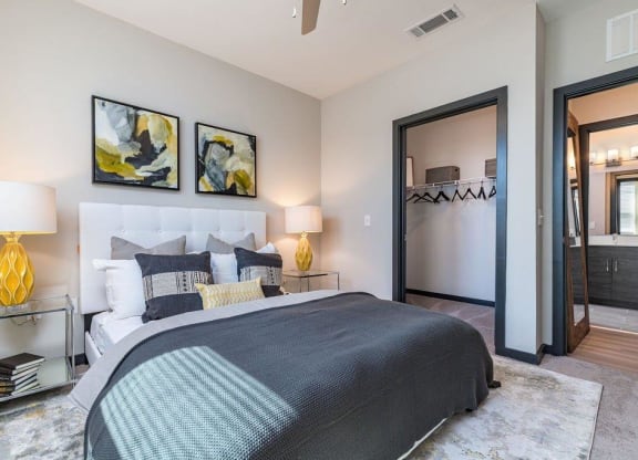 a bedroom with a bed and a closet