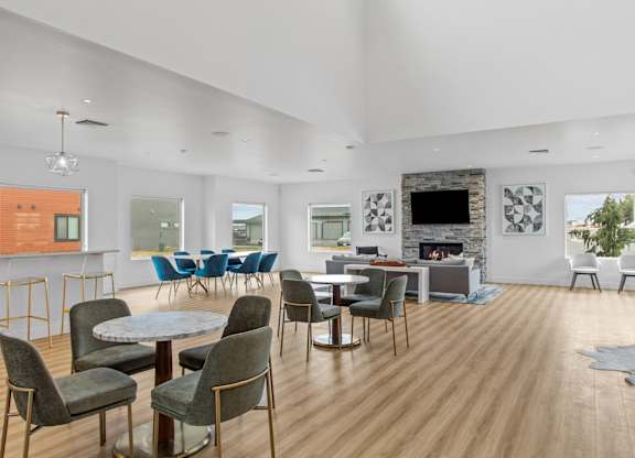 a living room filled with furniture and a fire place