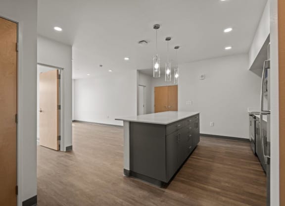 Kitchen with Island and cabinets at Ironside Apartments, Washington