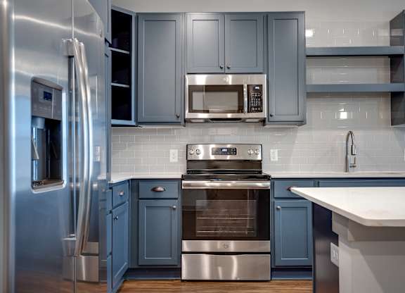 Alton Optimist Park Kitchen with Blue Cabinets