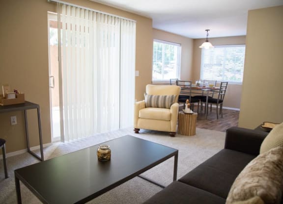 a living room with a couch and a table