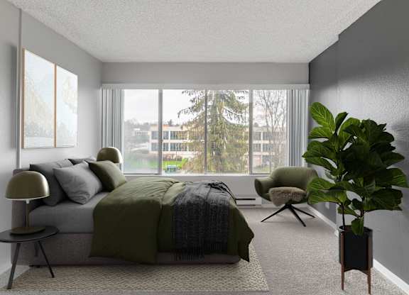 A bedroom with a bed, chair, and potted plant.