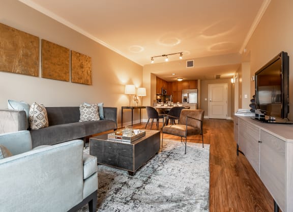 The Mercer Living Room with couches and TV