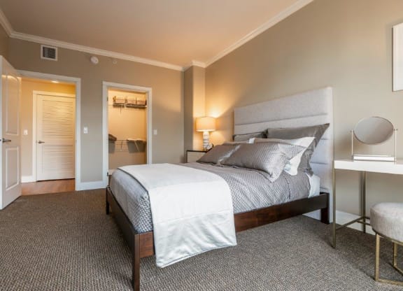 The Mercer bedroom with bed, closet, and desk