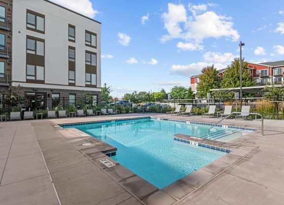 Meritage West Apartment Homes in Boise, Idaho Pool with Lounge Chairs