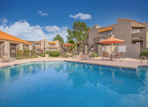 Metro on First Apartments in Tucson, Arizona Exterior and Pool with Lounge Chairs