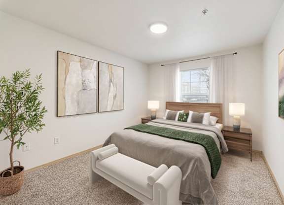 A bedroom with two beds and a plant.