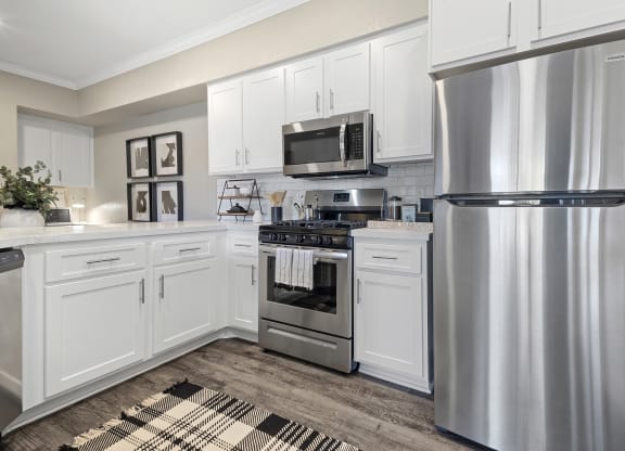 Estancia at Mission Grove Apartments Kitchen with Stainless Steel Appliances