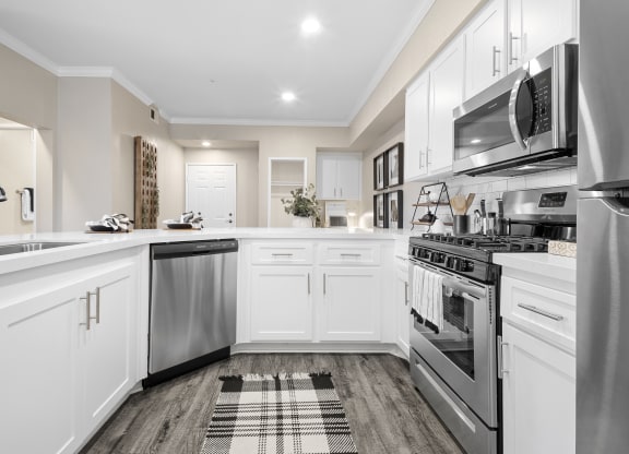 Estancia at Mission Grove Apartments Kitchen with Stainless Steel Appliances