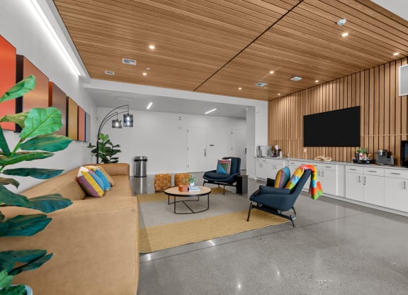 a living room with a couch and chairs  ironside apartments