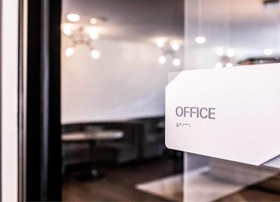 Close Up View of Office Sign