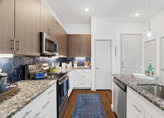 Woodlands at the Preserve Apartments in Garland, Texas Model Kitchen