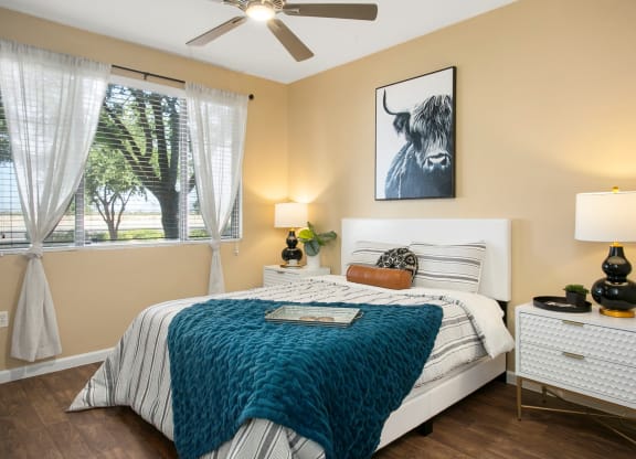 Painted Trails Bedroom with Hardwood Floors