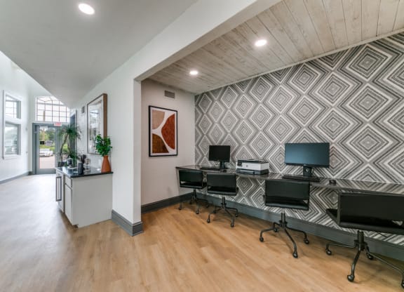 the preserve at ballantyne commons cyber office space with desks and chairs