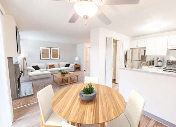 A modern dining room with a wooden table and white chairs.