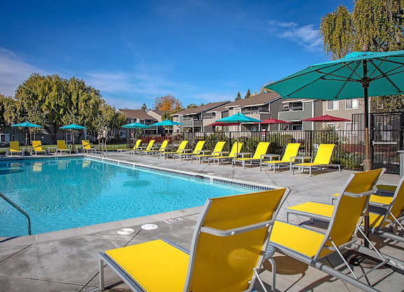 The Alexandar Pool with Lounge Chairs
