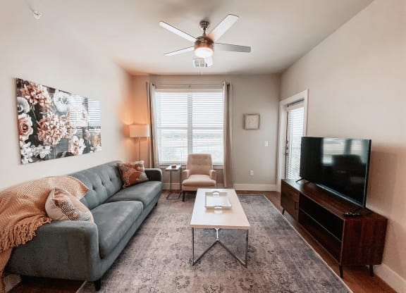 Living Room with Private Patio at Presidio at River East, Fort Worth, TX